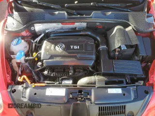2014 Volkswagen Beetle 1.8T w/Premium z VIN 3VW517AT9EM819966, wystawiony jako Copart lot #76990014 z przebiegiem Nie podano mil oraz Nie do naprawy • Non repairable. Historia ofert i sprzedaży dostępna na DreamBid. Obrazek 11.