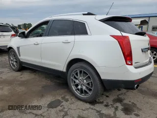 2016 Cadillac SRX Performance Collection with VIN 3GYFNCE31GS580002, listed as a Copart auction lot 62667475 with 135,097 mi miles and Salvage title. Bid and sale history available at DreamBid. Image 2.