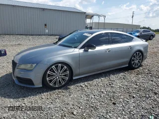 2013 Audi A7 Prestige с VIN WAU2GAFC1DN074660, выставлен на аукционе Copart как лот 62410655 с пробегом 164 801 миль миль и Списание • Salvage title. История ставок и продаж доступна на DreamBid. Изображение 1.
