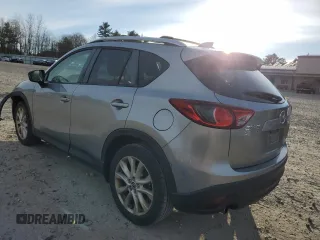 2014 Mazda CX-5 Grand Touring with VIN JM3KE4DY2E0360872, listed as a Copart auction lot 41597495 with 152,412 mi miles and Clean Title. Bid and sale history available at carsss.com. Image 2.