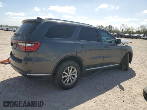 2018 Dodge Durango SXT with VIN 1C4RDJAG0JC329682, listed as a Copart auction lot 49541005 with 102,596 mi miles and Salvage Title. Bid and sale history available at DreamBid. Image 3.