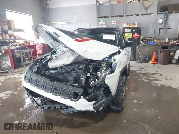 2022 Jeep Compass Trailhawk with VIN 3C4NJDDB8NT199704, listed as a IAAI auction lot 41611028 with 27,247 mi miles and . Bid and sale history available at DreamBid. Image 6.