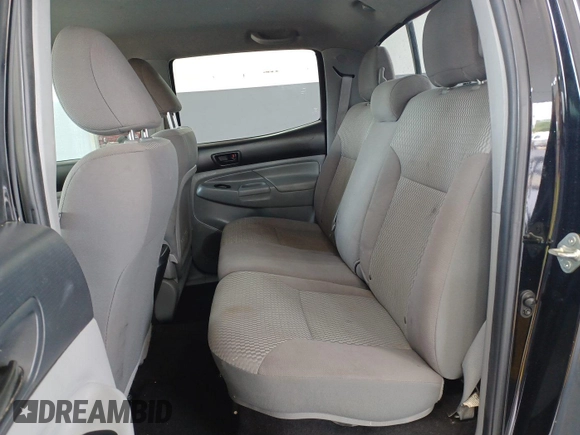 2014 Toyota Tacoma with VIN 3TMMU4FN8EM068633, listed as a IAAI auction lot 42727713 with 185,402 mi miles and . Bid and sale history available at DreamBid. Image 1.