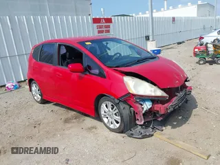 2009 Honda Fit Sport z VIN JHMGE886X9S014480, wystawiony jako IAAI lot #42313977 z przebiegiem 150 498 mil mil oraz . Historia ofert i sprzedaży dostępna na DreamBid. Obrazek 1.