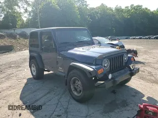 2003 Jeep Wrangler Sport z VIN 1J4FA49S13P347815, wystawiony jako Copart lot #59536685 z przebiegiem 74 298 mil mil oraz Szkoda całkowita • Salvage title. Historia ofert i sprzedaży dostępna na DreamBid. Obrazek 14.