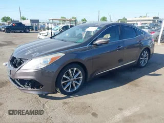 2015 Hyundai Azera with VIN KMHFG4JGXFA439603, listed as a IAAI auction lot 42157274 with 135,990 mi miles and . Bid and sale history available at carsss.com. Image 2.
