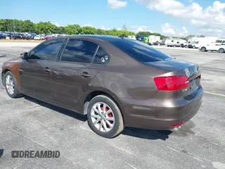 2011 Volkswagen Jetta SE with VIN 3VWDZ7AJ3BM396168, listed as a IAAI auction lot 41682745 with 127,052 mi miles and . Bid and sale history available at DreamBid. Image 3.