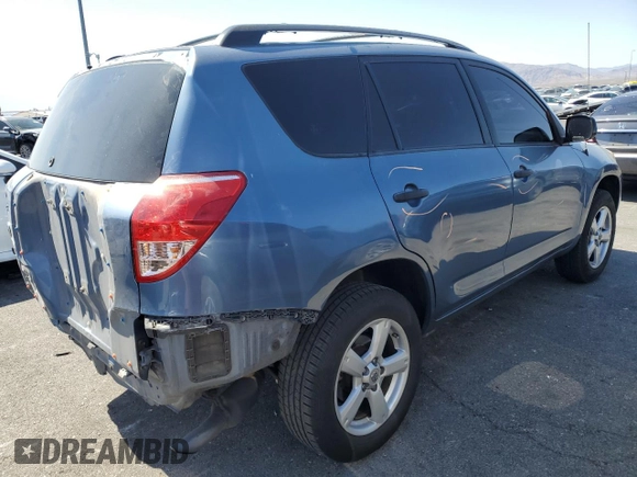 2007 Toyota RAV4 with VIN JTMZD33VX76052053, listed as a Copart auction lot 52215005 with 134,954 mi miles and Salvage Title. Bid and sale history available at carsss.com. Image 3.