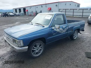 1988 Toyota Pickup with VIN JT4RN50R5J5169942, listed as a IAAI auction lot 42152517 with 218,579 mi miles and . Bid and sale history available at DreamBid. Image 2.