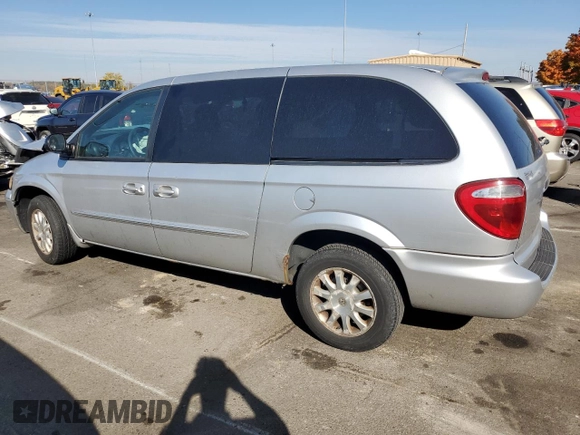 2003 Chrysler Town & Country LX with VIN 2C4GP44L63R154969, listed as a Copart auction lot 77435844 with 122,813 mi miles and Salvage Title. Bid and sale history available at DreamBid. Image 2.