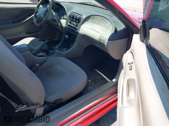 1999 Ford Mustang with VIN 1FAFP4042XF229616, listed as a IAAI auction lot 42047185 with 287,758 mi miles and . Bid and sale history available at DreamBid. Image 5.