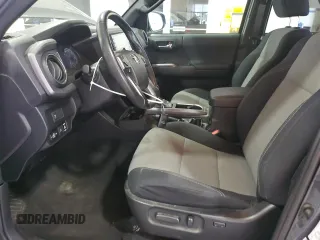 2021 Toyota Tacoma SR with VIN 3TMCZ5ANXMM425903, listed as a Copart auction lot 57963425 with 61,458 mi miles and Salvage title. Bid and sale history available at DreamBid. Image 7.