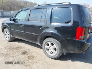 2009 Honda Pilot EX-L with VIN 5FNYF48529B035128, listed as a IAAI auction lot 42006450 with 214,069 mi miles. Bid and sale history available at carsss.com. Image 3.