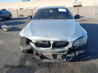 2011 BMW 3 Series 335is with VIN WBAKG1C57BE618727, listed as a IAAI auction lot 41234102 with 154,007 mi miles and . Bid and sale history available at carsss.com. Image 12.