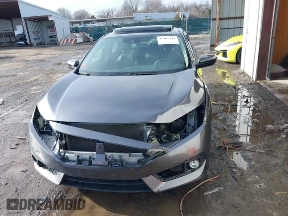 2018 Honda Civic EX-L z VIN JHMFC1F85JX014701, wystawiony jako IAAI lot #41467342 z przebiegiem 50 292 mil mil oraz . Historia ofert i sprzedaży dostępna na DreamBid. Obrazek 6.