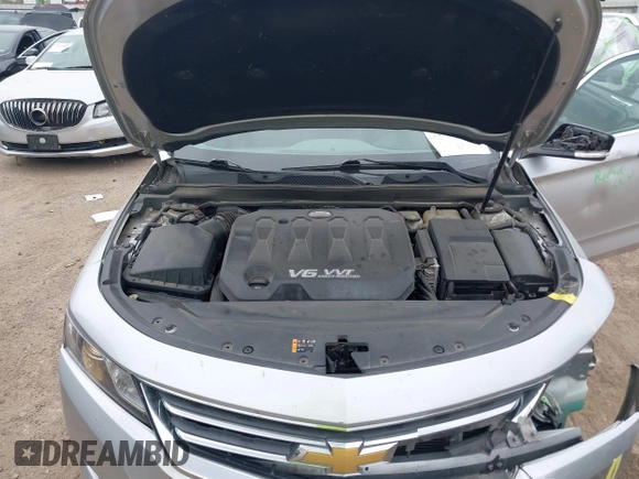 2014 Chevrolet Impala LT with VIN 2G1125S33E9101056, listed as a IAAI auction lot 41877161 with 130,757 mi miles and . Bid and sale history available at DreamBid. Image 10.