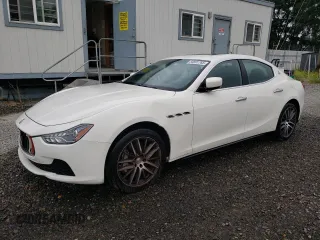 2014 Maserati Ghibli z VIN ZAM57XSA3E1101014, wystawiony jako Copart lot #59591765 z przebiegiem 91 892 mil mil oraz Czysty tytuł • Clean title. Historia ofert i sprzedaży dostępna na DreamBid. Obrazek 1.