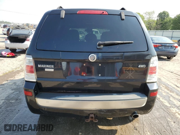 2009 Mercury Mariner Premier с VIN 4M2CU97G69KJ23595, выставлен на аукционе Copart как лот 59131405 с пробегом 153 196 миль миль и Списание • Salvage title. История ставок и продаж доступна на DreamBid. Изображение 6.