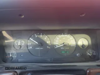 1997 Jeep Grand Cherokee Laredo with VIN 1J4GZ58S1VC760400, listed as a Copart auction lot 43932815 with 108,112 mi miles and Salvage Title. Bid and sale history available at carsss.com. Image 9.