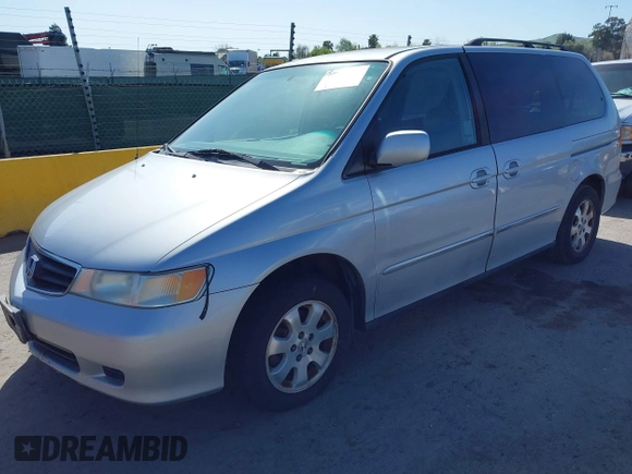 2003 Honda Odyssey EX-L with VIN 5FNRL18903B075004, listed as a IAAI auction lot 41954985 with 225,907 mi miles and . Bid and sale history available at DreamBid. Image 2.