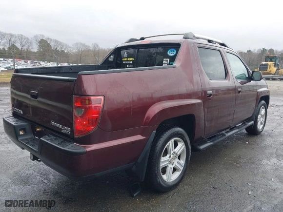 2009 Honda Ridgeline RTL with VIN 5FPYK16559B103698, listed as a IAAI auction lot 41479390 with 144,554 mi miles. Bid and sale history available at carsss.com. Image 4.