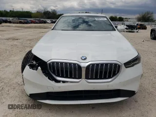 2024 BMW 5 Series 530i with VIN WBA43FJ03RCR61887, listed as a Copart auction lot 69975144 with 2,737 mi miles and Salvage Title. Bid and sale history available at carsss.com. Image 5.