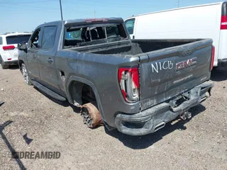 2022 GMC Sierra 1500 AT4 with VIN 3GTP9EEL2NG120275, listed as a IAAI auction lot 42009145 with 54,721 mi miles and . Bid and sale history available at DreamBid. Image 3.