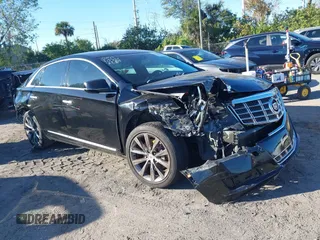 2014 Cadillac XTS with VIN 2G61L5S34E9261034, listed as a IAAI auction lot 41250779 with 178,218 mi miles. Bid and sale history available at carsss.com. Image 12.