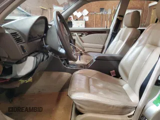 1995 Mercedes-Benz C with VIN WDBHA28E8SF115598, listed as a Copart auction lot 50145195 with 129,134 mi miles and Clean Title. Bid and sale history available at carsss.com. Image 7.