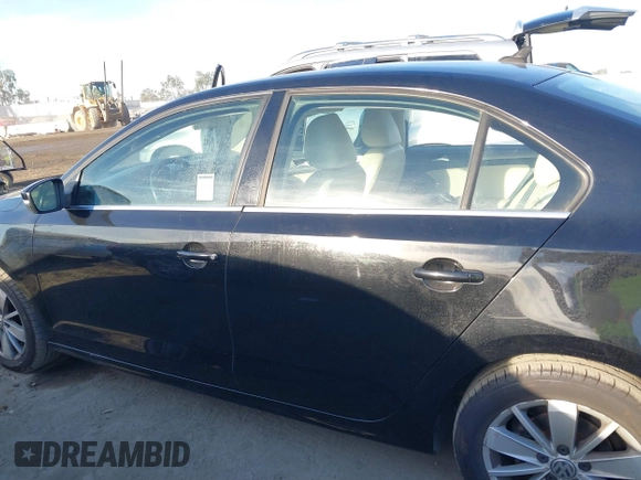 2015 Volkswagen Jetta Sedan 1.8T SE with VIN 3VWD17AJ3FM407697, listed as a IAAI auction lot 40659086 with 107,834 mi miles. Bid and sale history available at carsss.com. Image 14.