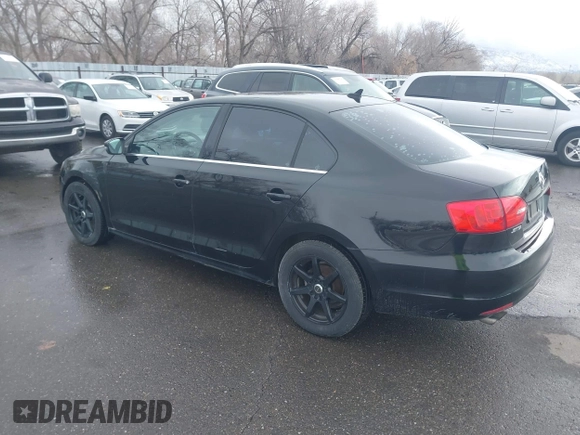 2014 Volkswagen Jetta SE with VIN 3VWD17AJXEM370663, listed as a IAAI auction lot 41612207 with 135,215 mi miles and . Bid and sale history available at DreamBid. Image 3.