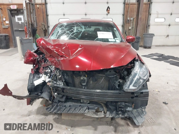 2019 Nissan Sentra S z VIN 3N1AB7AP7KY257283, wystawiony jako IAAI lot #42012338 z przebiegiem 103 503 mil mil oraz . Historia ofert i sprzedaży dostępna na DreamBid. Obrazek 13.
