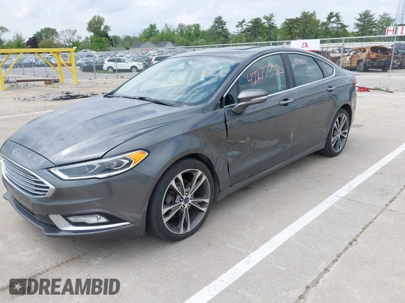 2017 Ford Fusion Titanium with VIN 3FA6P0D93HR261526, listed as a IAAI auction lot 42277350 with 117,388 mi miles and . Bid and sale history available at DreamBid. Image 2.