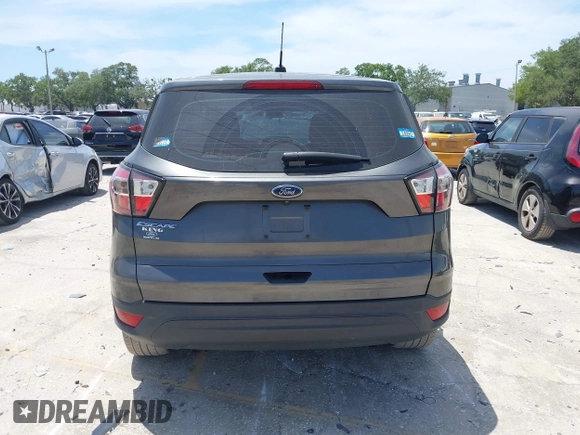 2018 Ford Escape S with VIN 1FMCU0F7XJUA16377, listed as a IAAI auction lot 42080136 with 81,060 mi miles and . Bid and sale history available at carsss.com. Image 17.