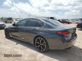 2022 BMW 5 Series M550i xDrive z VIN WBA13BK09NCJ00508, wystawiony jako Copart lot #58077634 z przebiegiem Nie podano mil oraz . Historia ofert i sprzedaży dostępna na DreamBid. Obrazek 2.
