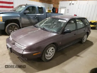 1998 Saturn SW z VIN 1G8ZK8271WZ165967, wystawiony jako Copart lot #73493044 z przebiegiem Nie podano mil oraz Szkody całkowita. Historia ofert i sprzedaży dostępna na DreamBid. Obrazek 1.