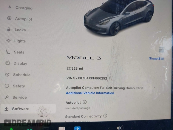 2023 Tesla Model 3 with VIN 5YJ3E1EAXPF666252, listed as a IAAI auction lot 42009929 with 27,328 mi miles and . Bid and sale history available at DreamBid. Image 7.