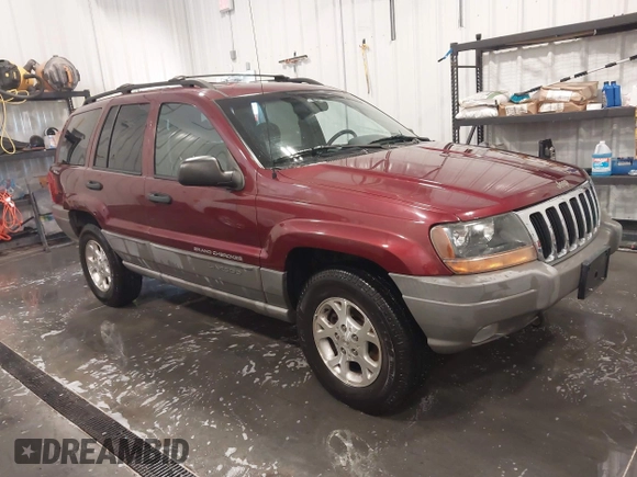2000 Jeep Grand Cherokee Laredo z VIN 1J4GW48N8YC151600, wystawiony jako IAAI lot #42178535 z przebiegiem 71 207 mil mil oraz . Historia ofert i sprzedaży dostępna na DreamBid. Obrazek 1.