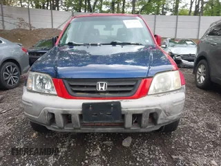 2001 Honda CR-V EX z VIN JHLRD18611C045140, wystawiony jako IAAI lot #42253482 z przebiegiem 142 237 mil mil oraz . Historia ofert i sprzedaży dostępna na DreamBid. Obrazek 13.