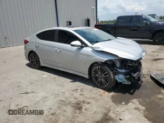 2018 Hyundai Elantra Sport с VIN KMHD04LB8JU556486, выставлен на аукционе Copart как лот 58772815 с пробегом 105 307 миль миль и Списание • Salvage title. История ставок и продаж доступна на DreamBid. Изображение 4.