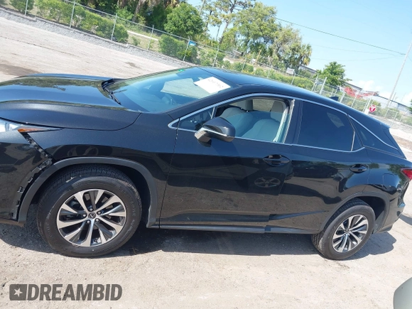 2021 Lexus RX with VIN 2T2AZMAA2MC196524, listed as a IAAI auction lot 42017362 with 80,922 mi miles. Bid and sale history available at carsss.com. Image 14.
