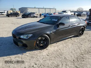 2015 BMW M6 z VIN WBS6C9C5XFD467952, wystawiony jako Copart lot #46312895 z przebiegiem 79 807 mil mil oraz Szkody całkowita. Historia ofert i sprzedaży dostępna na DreamBid. Obrazek 1.