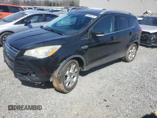 2016 Ford Escape Titanium with VIN 1FMCU9J98GUA77653, listed as a Copart auction lot 49594515 with 186,002 mi miles and Salvage Title. Bid and sale history available at DreamBid. Image 1.