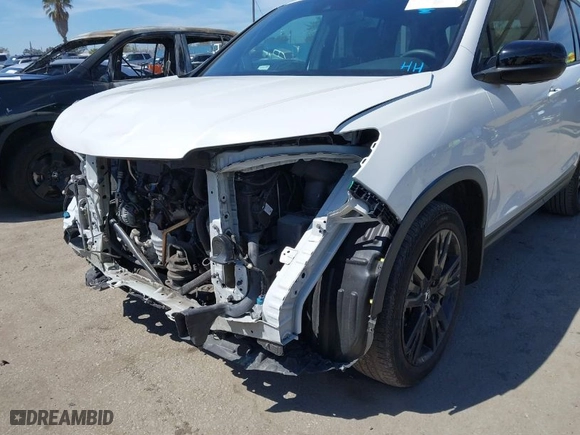 2021 Honda Passport Sport with VIN 5FNYF7H26MB004609, listed as a IAAI auction lot 41882670 with 77,934 mi miles. Bid and sale history available at carsss.com. Image 6.
