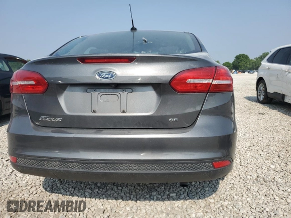 2017 Ford Focus SE with VIN 1FADP3F24HL288404, listed as a Copart auction lot 59314225 with 88,478 mi miles and Salvage title. Bid and sale history available at DreamBid. Image 6.