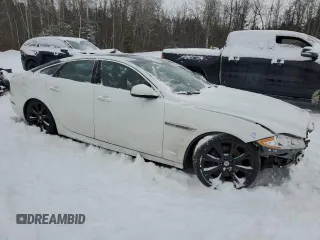 2015 Jaguar XJ Premium Luxury with VIN SAJXJ1CD0F8V88669, listed as a Copart auction lot 86063734 with 155,712 mi miles and Clean Title. Bid and sale history available at DreamBid. Image 4.