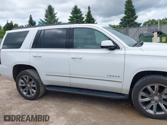 2020 Chevrolet Tahoe LT with VIN 1GNSKBKC8LR108377, listed as a IAAI auction lot 42545775 with 90,425 mi miles and . Bid and sale history available at DreamBid. Image 13.
