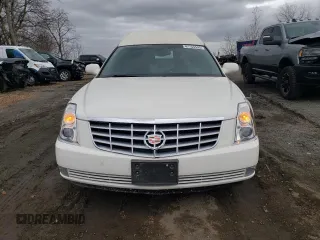 2006 Cadillac DTS Professional z VIN 1GEEH06Y56U500692, wystawiony jako Copart lot #56546565 z przebiegiem 26 810 mil mil oraz Szkody całkowita. Historia ofert i sprzedaży dostępna na DreamBid. Obrazek 5.