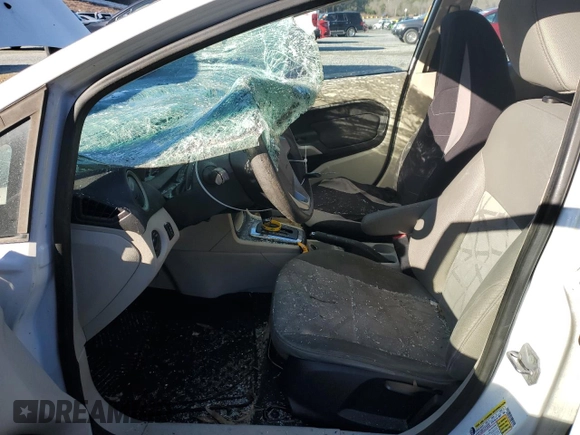 2012 Ford Fiesta SE with VIN 3FADP4BJ3CM101275, listed as a Copart auction lot 85560904 with 101,169 mi miles and Salvage Title. Bid and sale history available at DreamBid. Image 7.