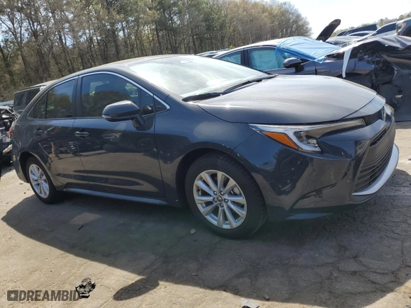2024 Toyota Corolla Hybrid LE with VIN JTDBCMFEXR3050524, listed as a Copart auction lot 50229295 with 6,004 mi miles and Salvage Title. Bid and sale history available at carsss.com. Image 4.